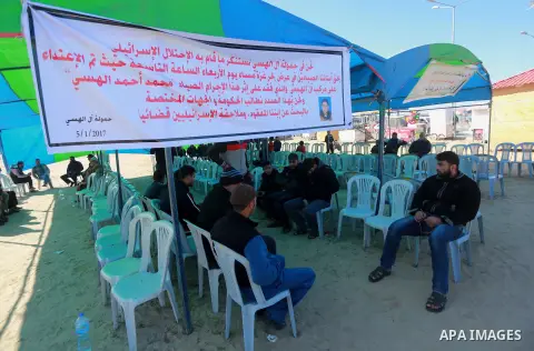 Palestinians take part in a protest to know the fate of a Palestinian fisherman Muhammad Al-Hissi who was missing after Israeli navy ship attacked and sunk a boat belonging to him at the Gaza seaport, on January 6, 2017....