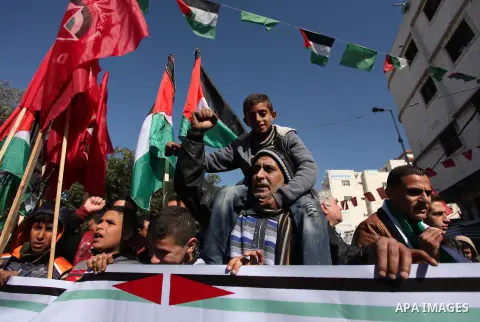 Palestinian supporters of the Democratic Front for the Liberation of Palestine (DFLP) take part in a protest against the ongoing electricity shortages in Gaza City on January 12, 2017. Power shortages in the Palestinian...