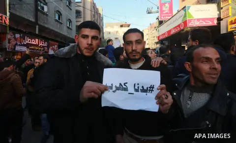 Palestinians take part in a demonstration against the ongoing electricity shortages , in Jabalia in the northern of Gaza Strip, on January 12, 2017. Power shortages in the Palestinian enclave have occurred repeatedly in...