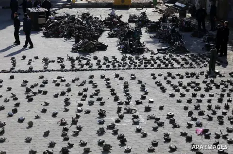 Palestinian policemen prepare illegal motorcycles and gas devices before destroy it in Gaza city on January 22, 2017. According to Palestinian traffic police more than 70 motorcycle and 1500 Gas device will be destroyed....