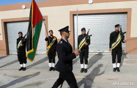 Palestinian policemen attend the opening ceremony of the detectives and control headquarters and police women, in Rafah in the southern Gaza strip, on January 23, 2017. Photo by Abed Rahim Khatib