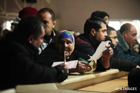 Palestinians wait for travel permits to cross into Egypt through the Rafah border crossing after it was opened by Egyptian authorities for humanitarian cases, in Rafah in the southern Gaza Strip January 28, 2017. Photo b...