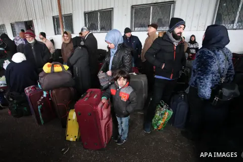 Palestinians wait for travel permits to cross into Egypt through the Rafah border crossing after it was opened by Egyptian authorities for humanitarian cases, in Rafah in the southern Gaza Strip January 28, 2017. Photo b...