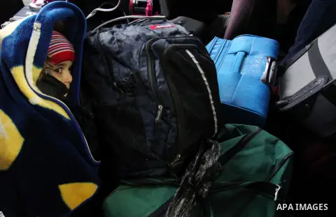 Palestinians wait for travel permits to cross into Egypt through the Rafah border crossing after it was opened by Egyptian authorities for humanitarian cases, in Rafah in the southern Gaza Strip January 28, 2017. Photo b...