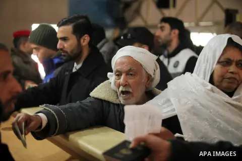 Palestinians wait for travel permits to cross into Egypt through the Rafah border crossing after it was opened by Egyptian authorities for humanitarian cases, in Rafah in the southern Gaza Strip January 28, 2017. Photo b...