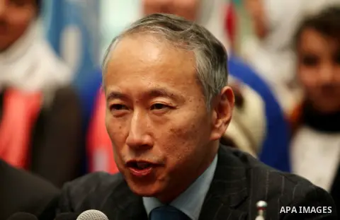 Japanese Ambassador to Palestine, Takeshi Okubo speaks during a joint press conference with Commissioner-General of the UN Relief and Works Agency (UNRWA) Pierre Krahenbuhl, at the headquarters United Nations Relief and...