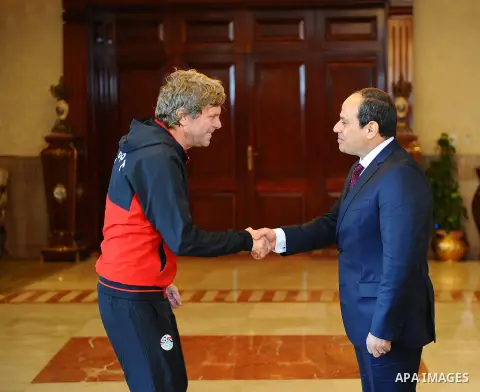 Egyptian President Abdel Fattah al-Sisi meets with Egyptian national football team upon their arrival at Cairo international airport after their participation in Africa Cup of Nations (CAN) which held in Gabon, in Cairo,...
