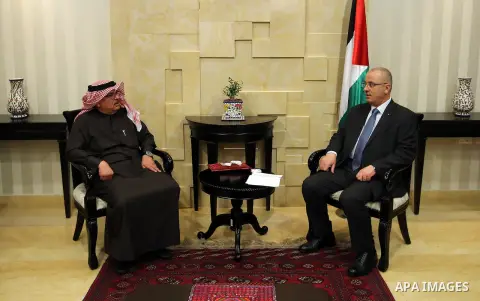 Palestinian Prime Minister Rami Hamdallah meets with Qatar's Ambassador to the Palestinian Authority, Mohammed Al Emadi, in the West Bank city of Ramallah on February 12, 2017. Photo by Prime Minister Office