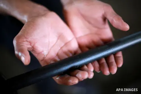 A Palestinian worker reuses plastics and metals to produce water hoses at a factory, in Gaza city, February 22, 2017. Workers collect the household recyclables, metals and plastic from landfill and garbage to sell to the...