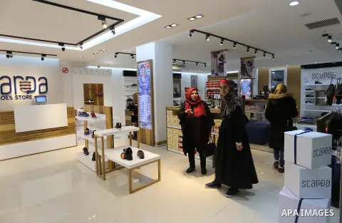 Palestinians shop in a new indoor shopping mall in the Gaza Strip, on February 23, 2017. In a welcome sign of normalcy, the first-of-its-kind indoor shopping mall -- complete with an international retail chain, three-sto...