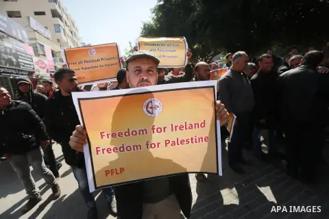 Palestinian supporters of the Popular Front for the Liberation of Palestine (PFLP), take part during a protest marking the first Anniversary of death of Palestinian Omar El-Nayef who was assassinated in Palestinian embas...