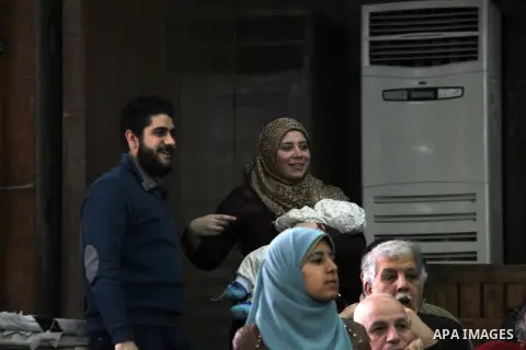 Relative of Egyptian Muslim Brotherhood defendants attend their trial, in a case known in media as "Rabaa Operations Room", in Cairo, on February 25, 2017. Photo by Amr Sayed