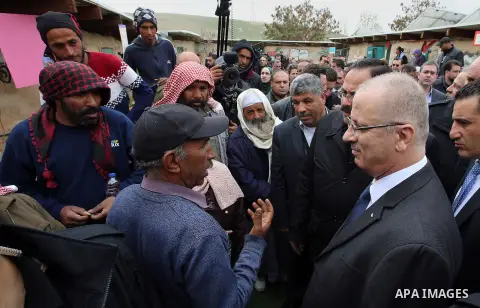 Palestinian Prime Minister, Rami Hamdallah, visits the combine Khan al-ahmar, in the East of Jerusalem, on March 2, 2017. Photo by Prime Minister Office