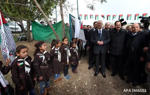 Palestinian Prime Minister, Rami Hamdallah, visits the combine Khan al-ahmar, in the East of Jerusalem, on March 2, 2017. Photo by Prime Minister Office