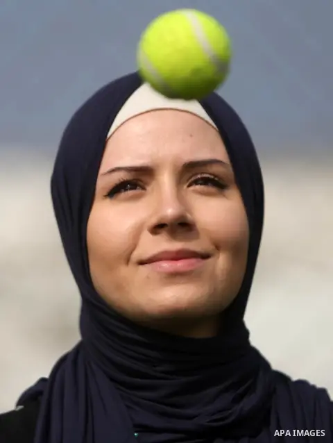A Palestinian girl takes part in Baseball training, in Gaza city, on February 20, 2017. Baseball is a bat-and-ball game played between two teams of nine players each, who take turns batting and fielding. Baseball is thou...