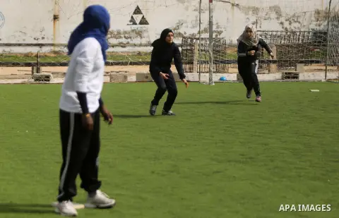 Palestinian girls take part in Baseball training, in Gaza city, on February 20, 2017. Baseball is a bat-and-ball game played between two teams of nine players each, who take turns batting and fielding. Baseball is though...