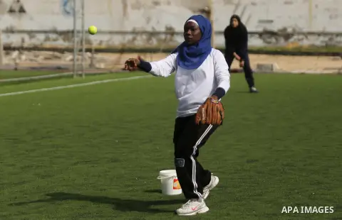Palestinian girls take part in Baseball training, in Gaza city, on February 20, 2017. Baseball is a bat-and-ball game played between two teams of nine players each, who take turns batting and fielding. Baseball is though...