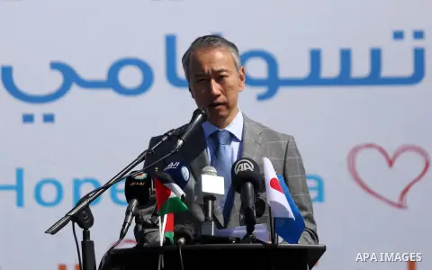 Japanese ambassador for Palestinian Affairs, Takeshi Okubo speaks during an event organised by the United Nations Relief and Works Agency (UNRWA) to mark the the sixth anniversary of the Tohoku earthquake and tsunami tha...