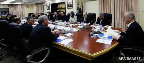 Palestinian Prime Minister Rami hamdallah heads the Palestinian cabinet meeting in the West Bank city of Ramallah on March 7, 2017. Photo by Prime Minister Office