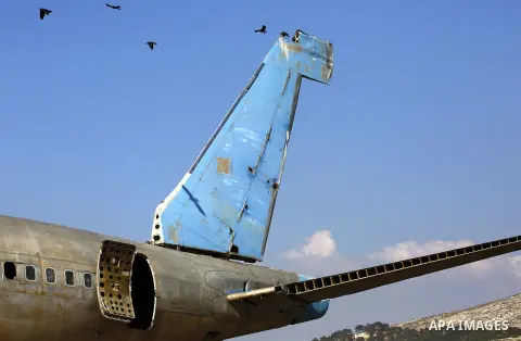 A retired Boeing airplane once belonging to an Israeli airline is seen in the west bank city of Nablus, on March 7, 2017. Photo by Wisam Hashlamoun