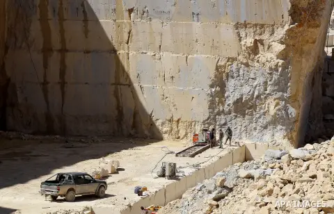 Palestinian labourers work at a quarry in the West Bank village of Taffouh near Hebron, 08 March 2017. According to the Palestinian Union of Stone and Marble, the stone and marble sector is considered to be one of the mo...