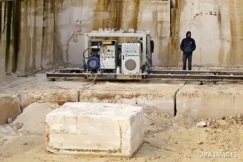 Palestinian labourers work at a quarry in the West Bank village of Taffouh near Hebron, 08 March 2017. According to the Palestinian Union of Stone and Marble, the stone and marble sector is considered to be one of the mo...