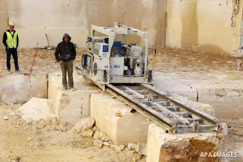 Palestinian labourers work at a quarry in the West Bank village of Taffouh near Hebron, 08 March 2017. According to the Palestinian Union of Stone and Marble, the stone and marble sector is considered to be one of the mo...