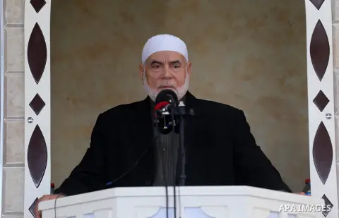 Deputy of the Legislative Council, Ahmed Bahar speaks in the presence of Senior political Hamas leader Ismail Haniya during the opening of a new mosque in Beit Lahiya in the northern Gaza strip on March 10, 2017. Photo b...