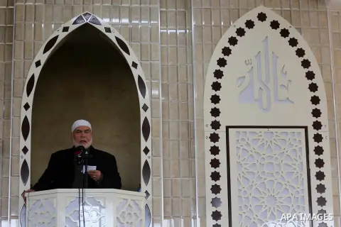 Deputy of the Legislative Council, Ahmed Bahar speaks in the presence of Senior political Hamas leader Ismail Haniya during the opening of a new mosque in Beit Lahiya in the northern Gaza strip on March 10, 2017. Photo b...