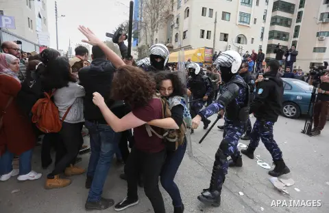 Protesters clash with Palestinian policemen following a demonstration against the trial of the martyr, Bassel al-Aaraj, in the West Bank city of Ramallah, on March 12, 2017. Photo by Stringer
