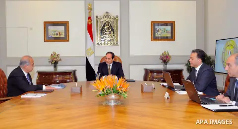 Egyptian President Abdelfattah Al-Sisi, meets with Prime Minister Ismail Sharif and Finance Minister Amr El Garhy, in Cairo, Egypt, March 12, 2017. Photo by Egyptian President Office