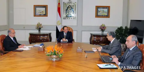 Egyptian President Abdelfattah Al-Sisi, meets with Prime Minister Ismail Sharif and Finance Minister Amr El Garhy, in Cairo, Egypt, March 12, 2017. Photo by Egyptian President Office