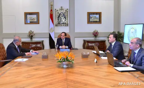 Egyptian President Abdelfattah Al-Sisi, meets with Prime Minister Ismail Sharif and Finance Minister Amr El Garhy, in Cairo, Egypt, March 12, 2017. Photo by Egyptian President Office