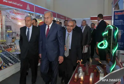 Egyptian Prime Minister Ismail Sharif attends Cairo International exposition, in Cairo, Egypt, on March 15, 2017. Photo by Stringer