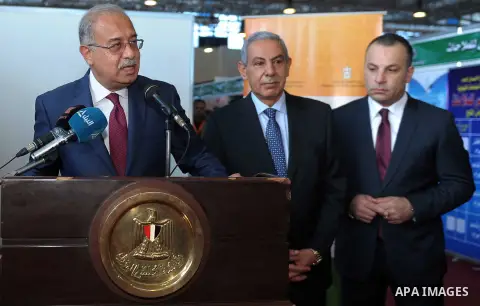 Egyptian Prime Minister Ismail Sharif attends Cairo International exposition, in Cairo, Egypt, on March 15, 2017. Photo by Stringer