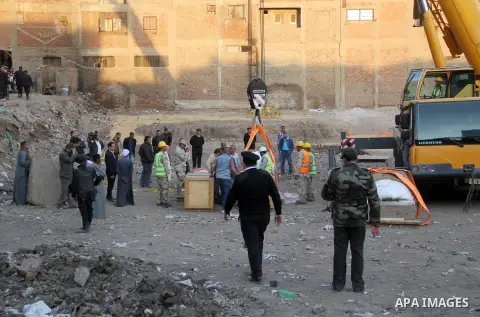 Egyptian workers use crane to lift the statue, recently discovered by a team of German-Egyptian archeologists before transport it to Egyptian museum in Cairo, Egypt on March 15, 2017. Statues of the kings and queens of t...