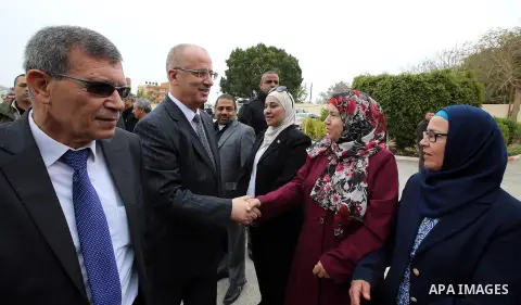 Palestinian Prime Minister Rami Hamdallah arrives before a meeting of council of Ministers in the West Bank city of Jericho, on March 21, 2017. Photo by Prime Minister Office