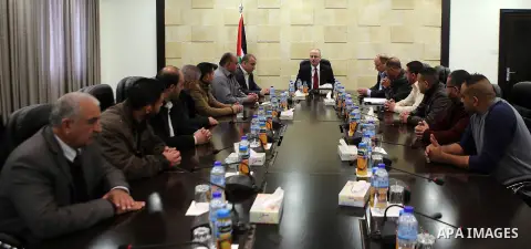 Palestinian Prime Minister Rami al-Hamdallah meets with Regulatory Authority for Qalandiya Camp , in the West Bank city of Ramallah on March 23 2017. Photo by Prime Minister Office
