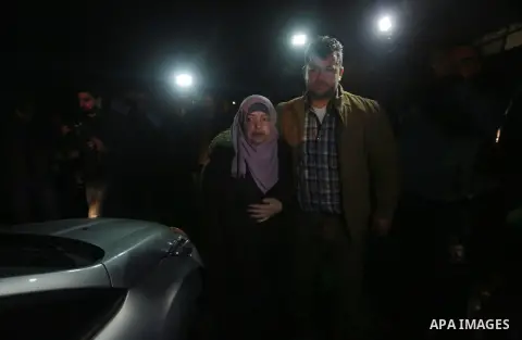 Nahid Asida, wife of Hamas official, Mazen Faqha who was shot dead by gunmen in the Gaza Strip arrives at a hospital morgue in Gaza City on March 24, 2017. Faqha was released along with more than 1,000 other Palestinians...