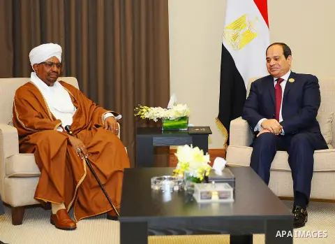 Egypt's President Abdel Fattah al-Sisi meets with Sudanese President Omar al-Bashir, on the sideline of the 28th Summit of the Arab League at the Dead Sea, Jordan March 29, 2017. Photo by Egyptian President Office