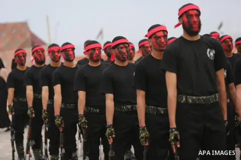 Palestinian police officers loyal to Hamas take part in a graduation ceremony in Gaza City March 30, 2017. Photo by Ashraf Amra