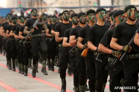 Palestinian police officers loyal to Hamas take part in a graduation ceremony in Gaza City March 30, 2017. Photo by Ashraf Amra