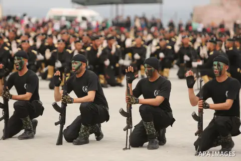 Palestinian police officers loyal to Hamas take part in a graduation ceremony in Gaza City March 30, 2017. Photo by Ashraf Amra