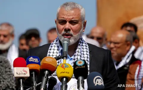 Senior political leaders of the Islamist movement, Ismail Haniyeh speaks during the opening ceremony of monument of Palestinian prisoners held in Israeli jails, in the northwest of Gaza city on April 01, 2017. Photo by A...