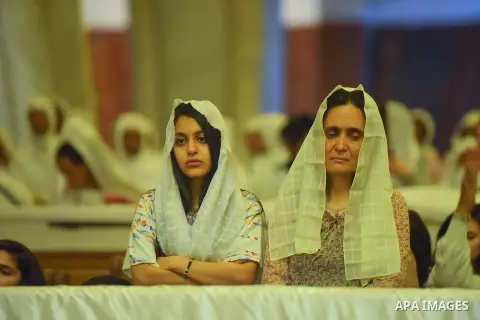 Egyptian Coptic Christians take part in an Easter Eve mass hosted by Pope Tawadros II at the St. Mark church in Cairo April 15, 2017. Photo by Amr Sayed