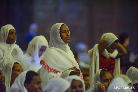 Egyptian Coptic Christians take part in an Easter Eve mass hosted by Pope Tawadros II at the St. Mark church in Cairo April 15, 2017. Photo by Amr Sayed
