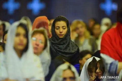 Egyptian Coptic Christians take part in an Easter Eve mass hosted by Pope Tawadros II at the St. Mark church in Cairo April 15, 2017. Photo by Amr Sayed