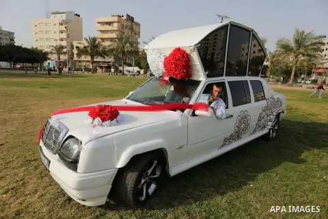 A Palestinian mechanic display his "Cinderella" vehicle in Gaza City on April 22, 2017. Made up of five different cars, it will be rented out for use at marriage ceremonies. Photo by Ashraf Amra