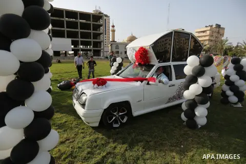 A Palestinian mechanic display his "Cinderella" vehicle in Gaza City on April 22, 2017. Made up of five different cars, it will be rented out for use at marriage ceremonies. Photo by Ashraf Amra