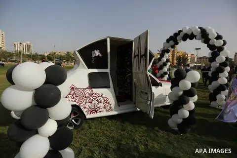 A Palestinian mechanic display his "Cinderella" vehicle in Gaza City on April 22, 2017. Made up of five different cars, it will be rented out for use at marriage ceremonies. Photo by Ashraf Amra